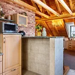 Dachwohnung Im Landhausstil *